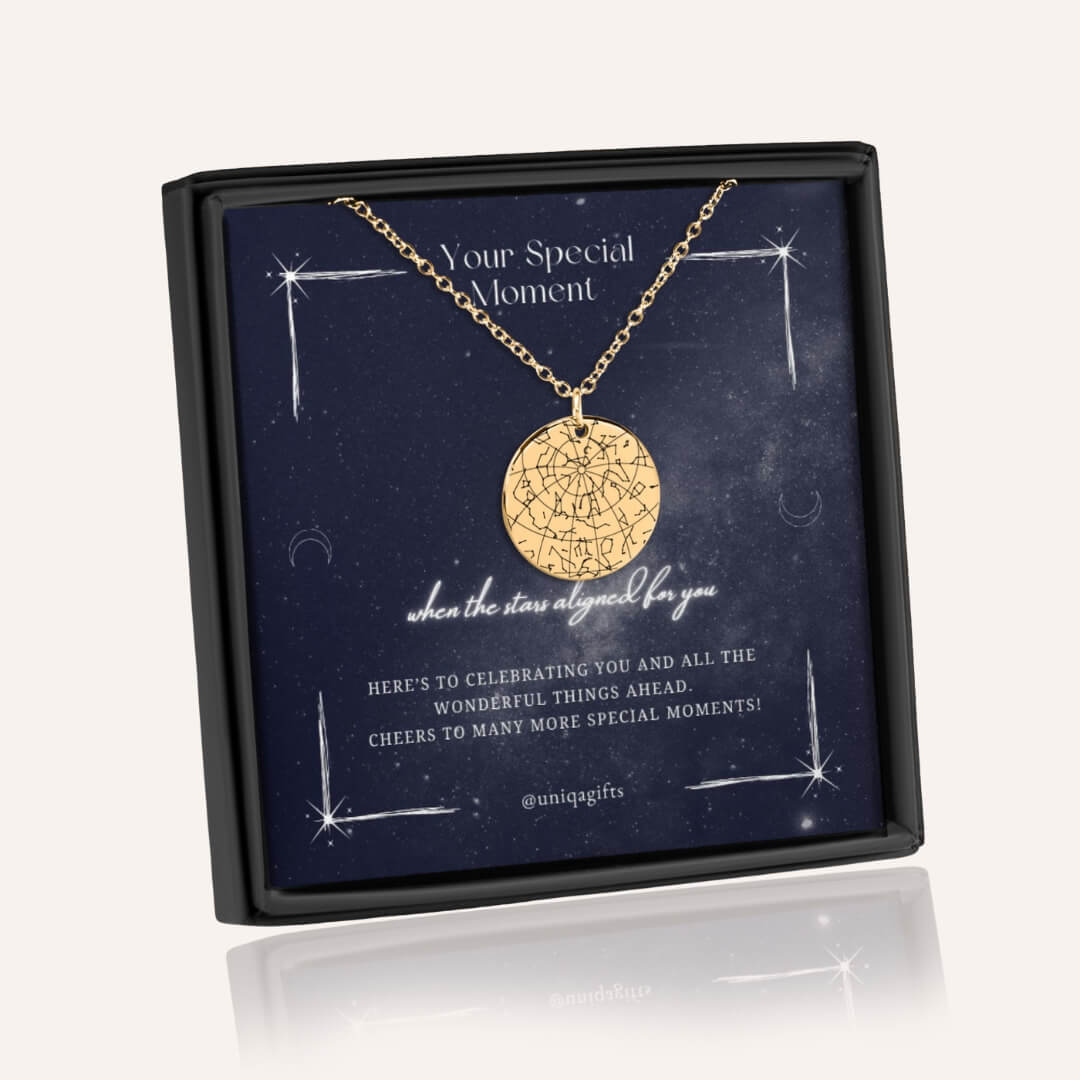 Gold custom star map necklace in a decorative jewelry box with a greeting card in starry night sky design